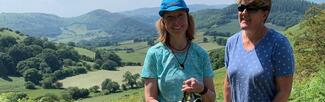 Ali from the Walking Hub with Clare Balding in the Kington countryside