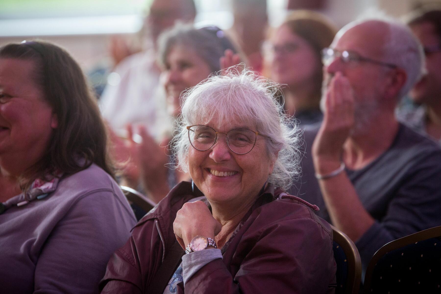 Audience laughing