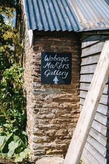 Wobage Makers Gallery sign on rustic barn