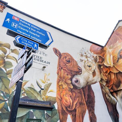 Street art mural called Cattles and Apples