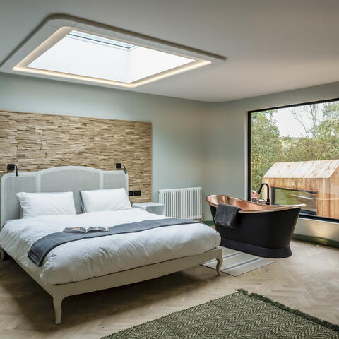 bedroom with copper bath