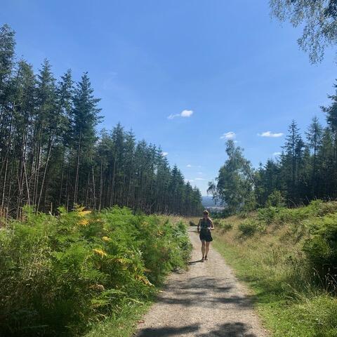 Lady running on a trail