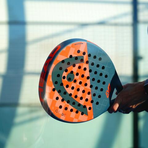 Player holding a Padel Raquet