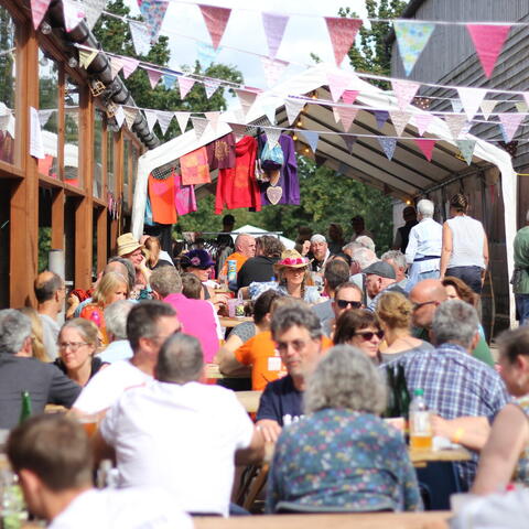 People enjoying the cider outside