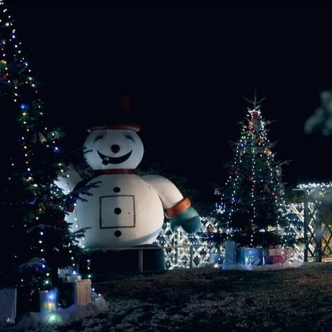 Winter wonderland scene with inflatable snowman