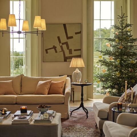 Living room decorated in neutral tones for Christmas