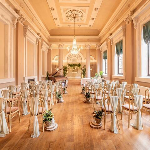 Beautiful large ballroom set up for a wedding ceremonty