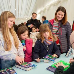 children getting books signed